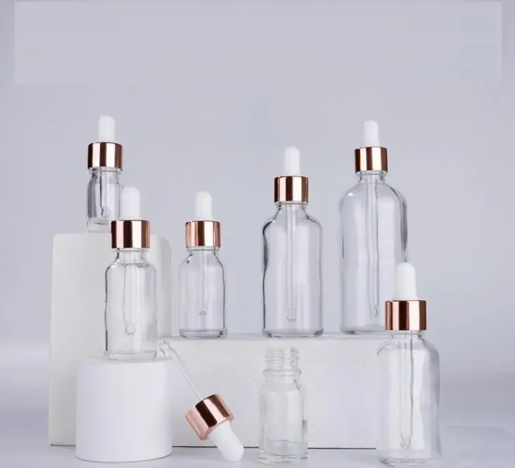 

Wholesale clear serum glass dropper bottles 5ml 10ml 15ml 20ml 30ml 50ml 100ml with rose gold lid for essential oils SN544