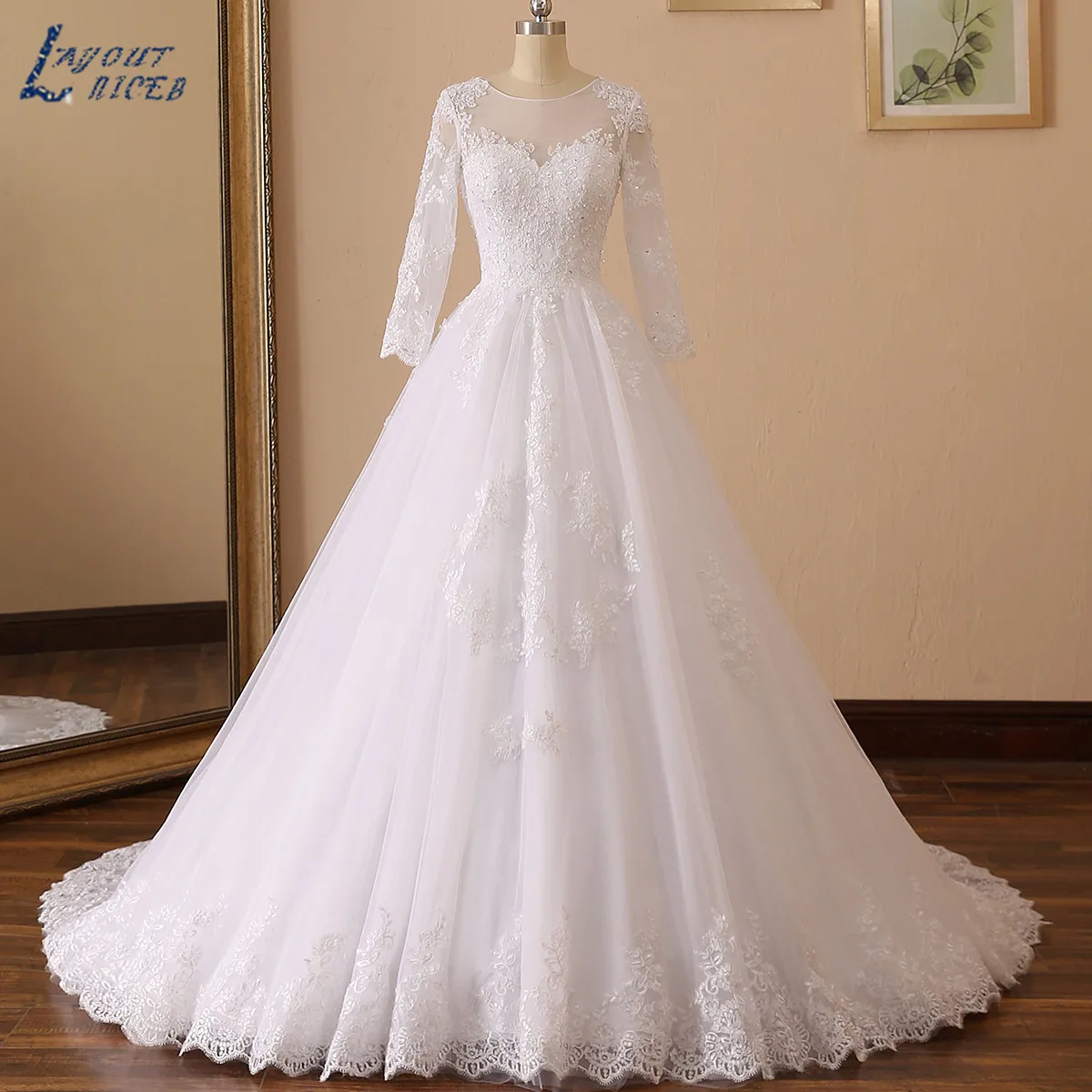 LAYOUT NICEB Long Sleeves Wedding Dress Elegant Lace Appliques Beads Vestido De Noiva Sexy Illusion Back Ball Gown Bridal Tulle