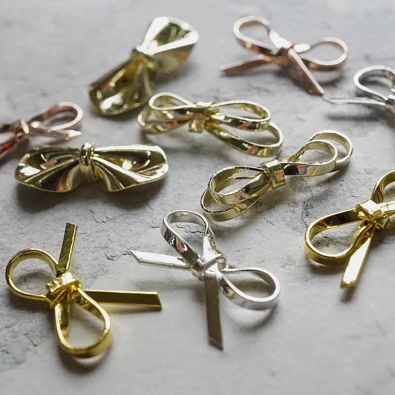 100pcs/lot Gold Silver Pink Handmade Bow Alloy Metal Rivet Nail Art Decorations Supplies Nails Accesorios Jewelry Designs Charms