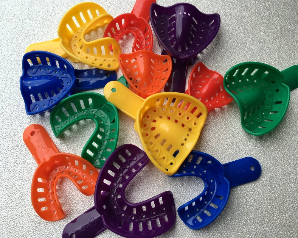 Bandejas de impresión de plástico para adultos y niños, material Dental de 12 piezas colores, como se muestra en la imagen