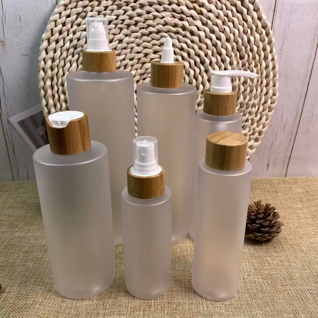 

100ml 120ml 250ml 500ml Clear frosted plastic pet pump lotion bottle with bamboo spray lid for shampoo toner cleansing oil