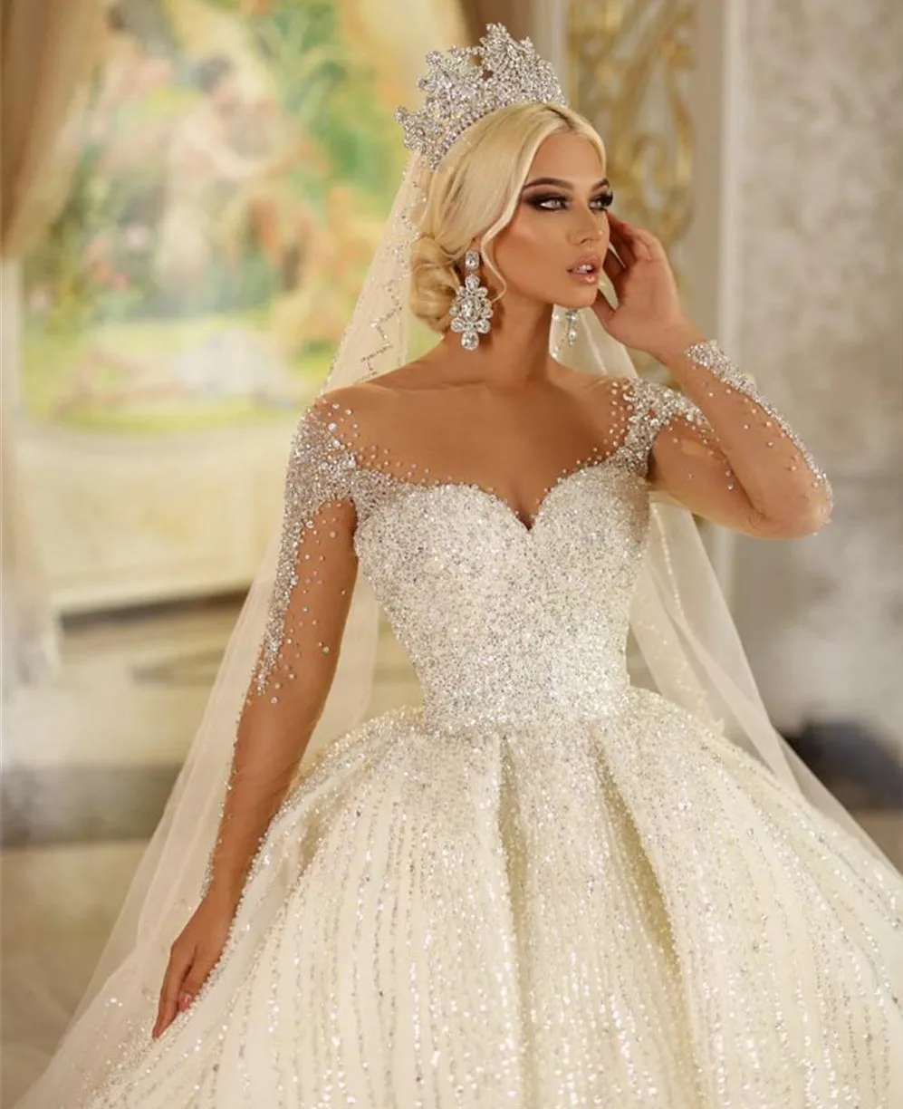 Lusso nuovo arrivo Dubai cristalli principessa abito da sposa bianco 2023 maniche Illusion perline gonfie abito da sposa corte treno