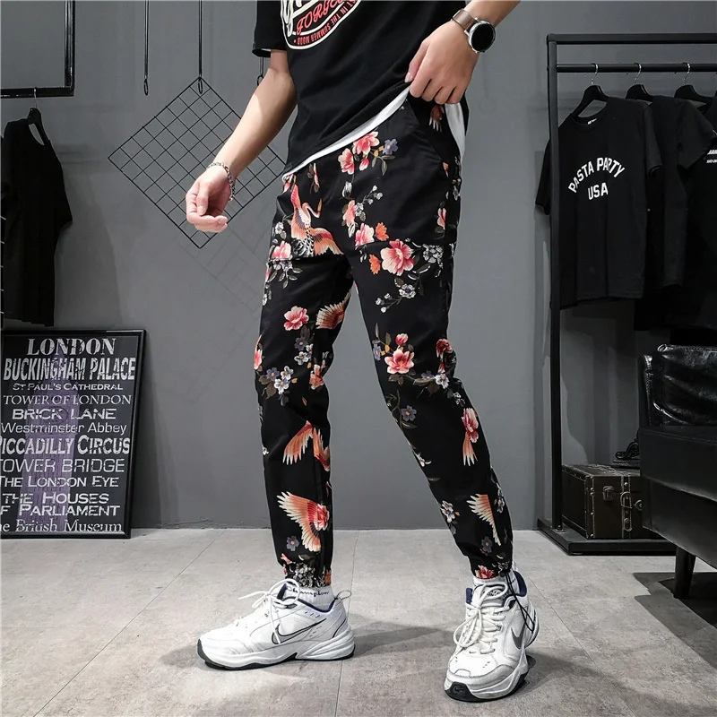 Pantaloni a vita bassa Streetwear Harajuku pantaloni sportivi stile cinese pantaloni Jogger estivi uomo Cargo Harem pantaloni Hip-Hop moda Casual fiore