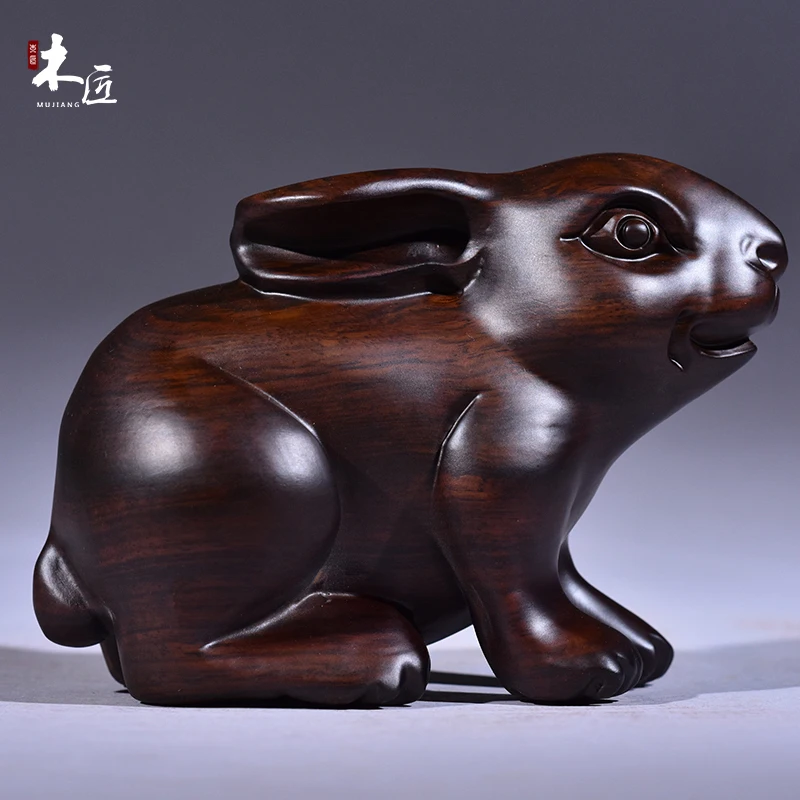 

Carved rabbits out of ebony Rabbit Black rosewood Real wood mato success zodiac rabbit real Handmade sculpture