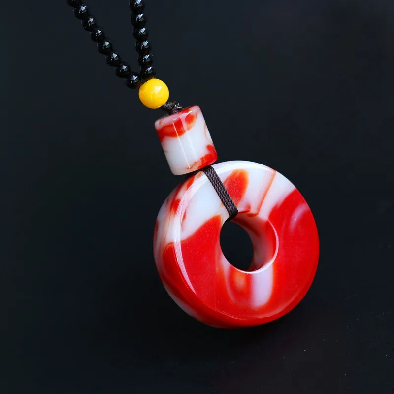 

Natural Xinjiang Gobi Hetian Jade Chicken Blood Jade Finger Pendant Men's and Women's Sweater Chain Pendant