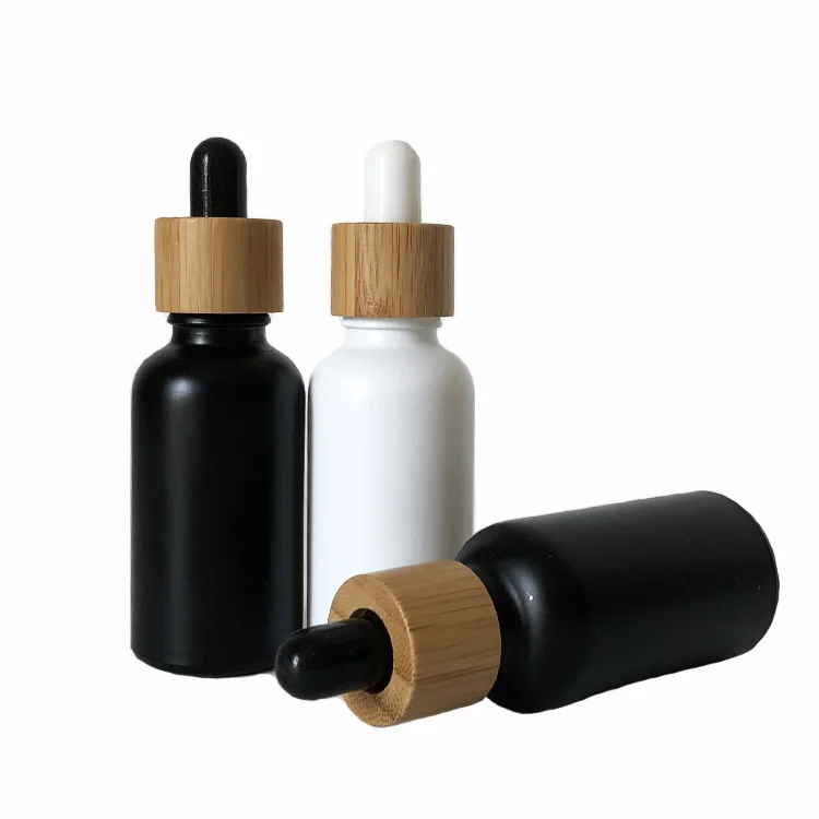 CBD Recycled eco friendly Round Natural Bamboo Wooden Lid Beard oil Frosted Black Glass Dropper Bottle with Caps 1oz 50ml100ml