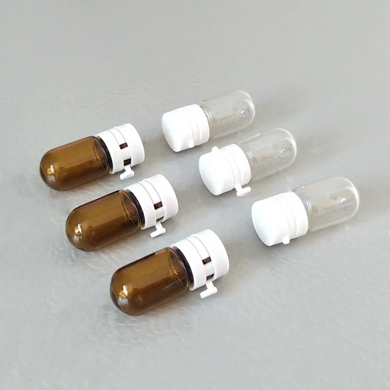 50pcs 2ml Empty Amber Clear Glass Essential Oil Bottles Cosmetic Jar Containers mini Tear cap Perfume Vials Essence Sample Pots