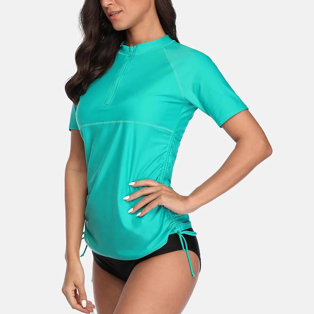 Charmo camicie Rash Guard a maniche corte da donna con Zip davanti costumi da bagno Top fasciato laterale Solid Top Diving Shirt UPF 50 +