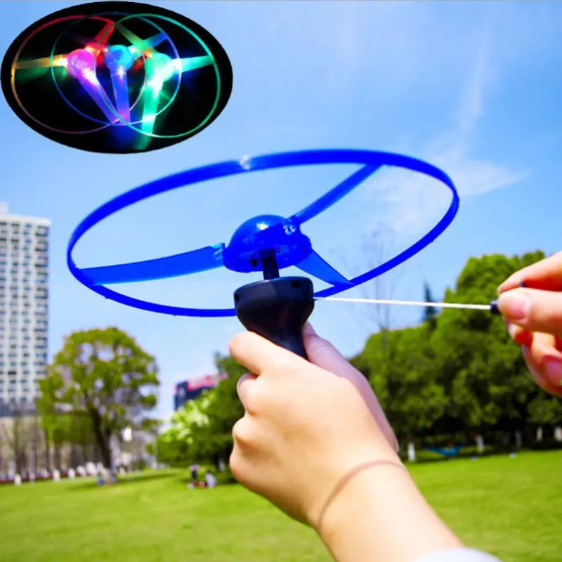 

1 PC LED Flashing Plastic Pull String Flying Saucer Propeller Toy Disc Helicopter New Kids Luminous Toys (Random Color)