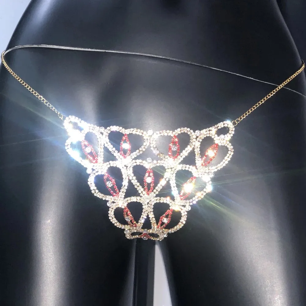 Lencería de lujo de cristal para niña, Bralette con arnés de cadena para el cuerpo, sujetador con diamantes de imitación de Navidad, forma de ojos, joyería para el cuerpo, conjunto de Tanga y sujetador Sexy