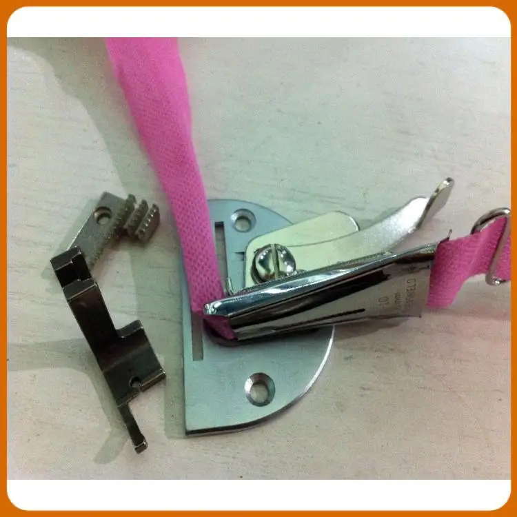 

RIGHT ANGLE BIAS BINDER Specializing in the production of sewing machine parts, no anti edge package special bags