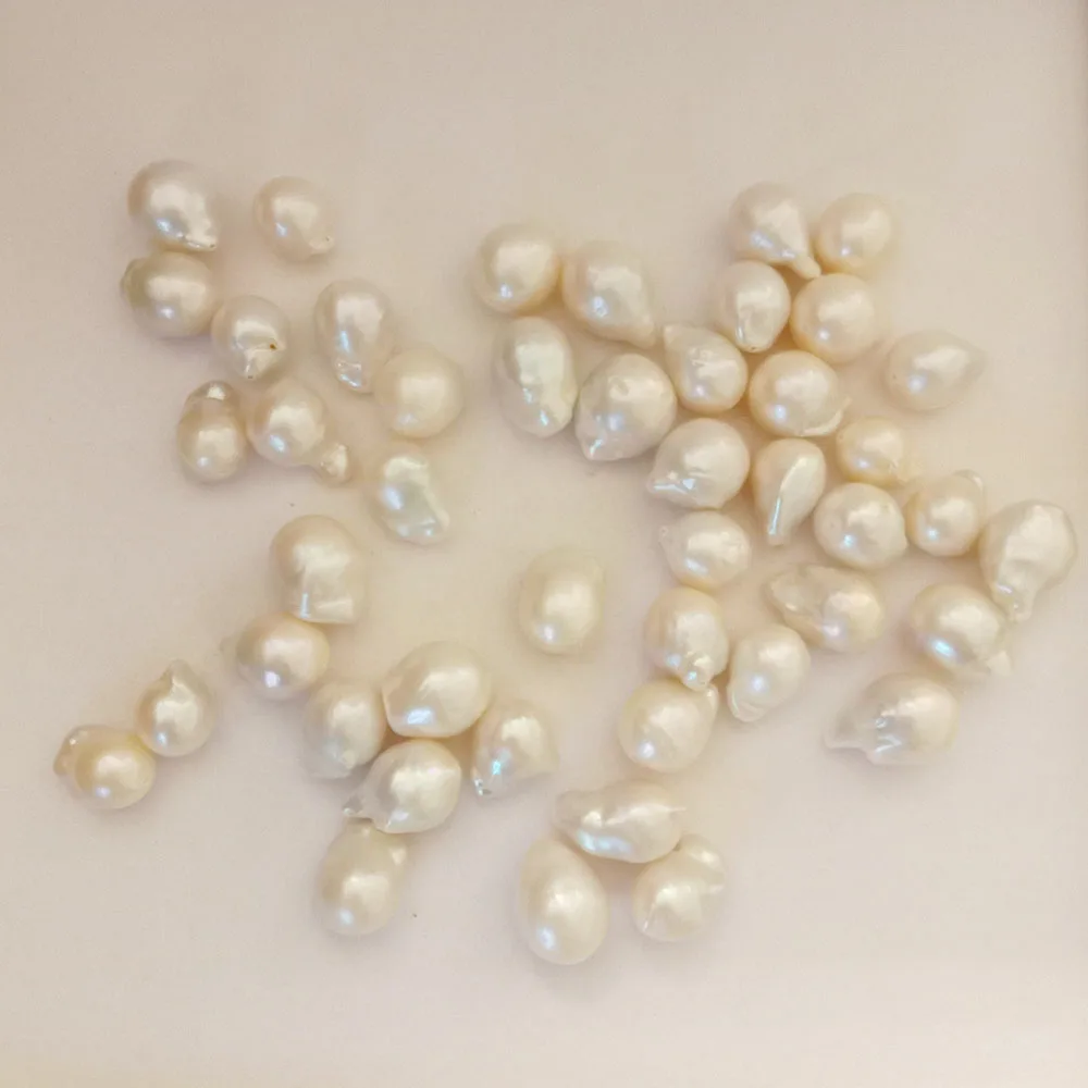 

2 pcS/LOT,high quality no flaw Nature freshwater loose pearl with baroque shape,full hole drilled,W12-14mm LENGTH:15-20 mm