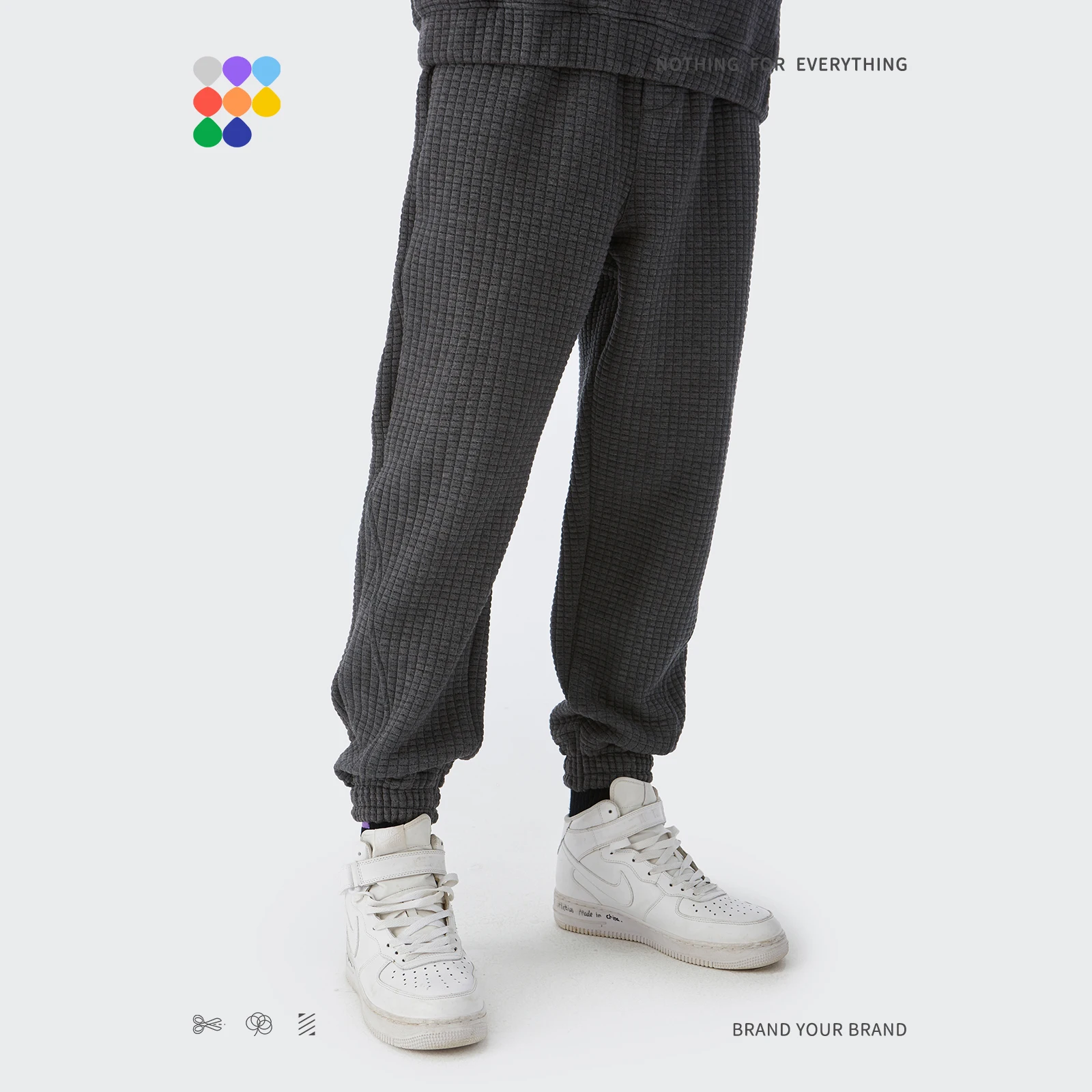 อัตราเงินเฟ้อฤดูหนาวหนาสบายๆกางเกงคู่แฟชั่นวาฟเฟิลถักกางเกงผู้ชายธรรมดา Joggers กางเกงกางเกงผู้หญิง