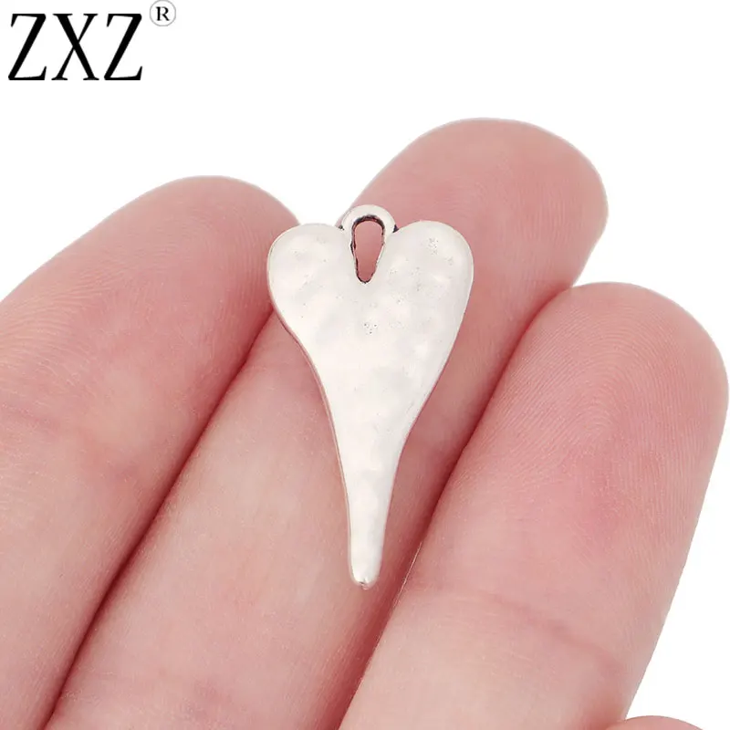 ZXZ 20pcs Tibetan Silver Hammered Heart Charms Pendants for Jewellery Making 27x14mm