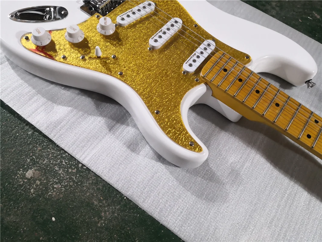 

custom 6 string stra white guitar,SSS pickups,fixed tremolo bridge,maple fingerboad chrome buttons