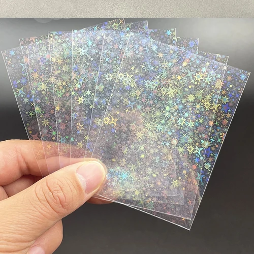 Imagen 2 del producto 50 unids/lote 65*90CM Protector de tarjetas pequeñas estrellas fundas de tarjetas con destellos láser para tarjetero YGO película protectora de lámina holográfica