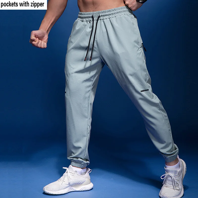 BINTUOSHI-Pantalones deportivos para correr para hombre, pantalones de chándal con bolsillos y cremallera, entrenamientos deportivos de fútbol,