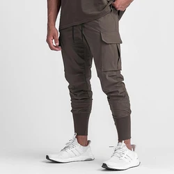 Pantaloni da Jogging da corsa da palestra ad asciugatura rapida da uomo pantaloni sportivi da Jogging pantaloni lunghi Fitness Sport Training pantaloni Cargo Casual maschili