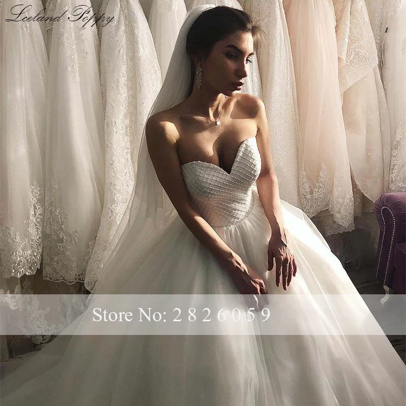 Lceland Poppy Customized Ball Gown Strapless Wedding Dresses Floor Length Pearls Beaded Sleeveless Bridal Gowns