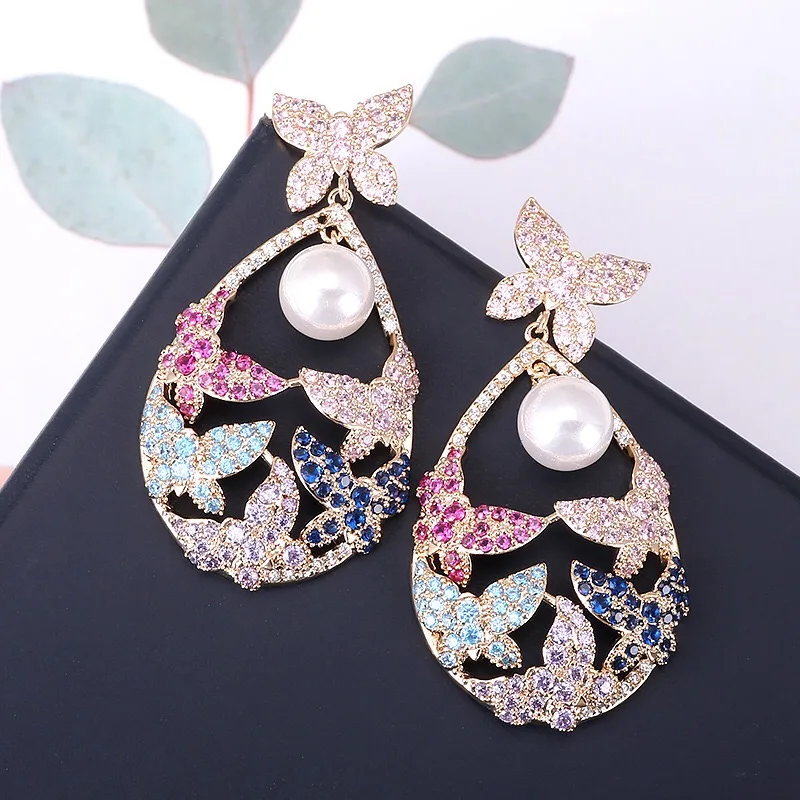 EYER-pendientes de circón de color plateado para mujer, aretes indios brillantes, accesorios de fiesta de boda, nuevo diseño de moda, venta al por mayor