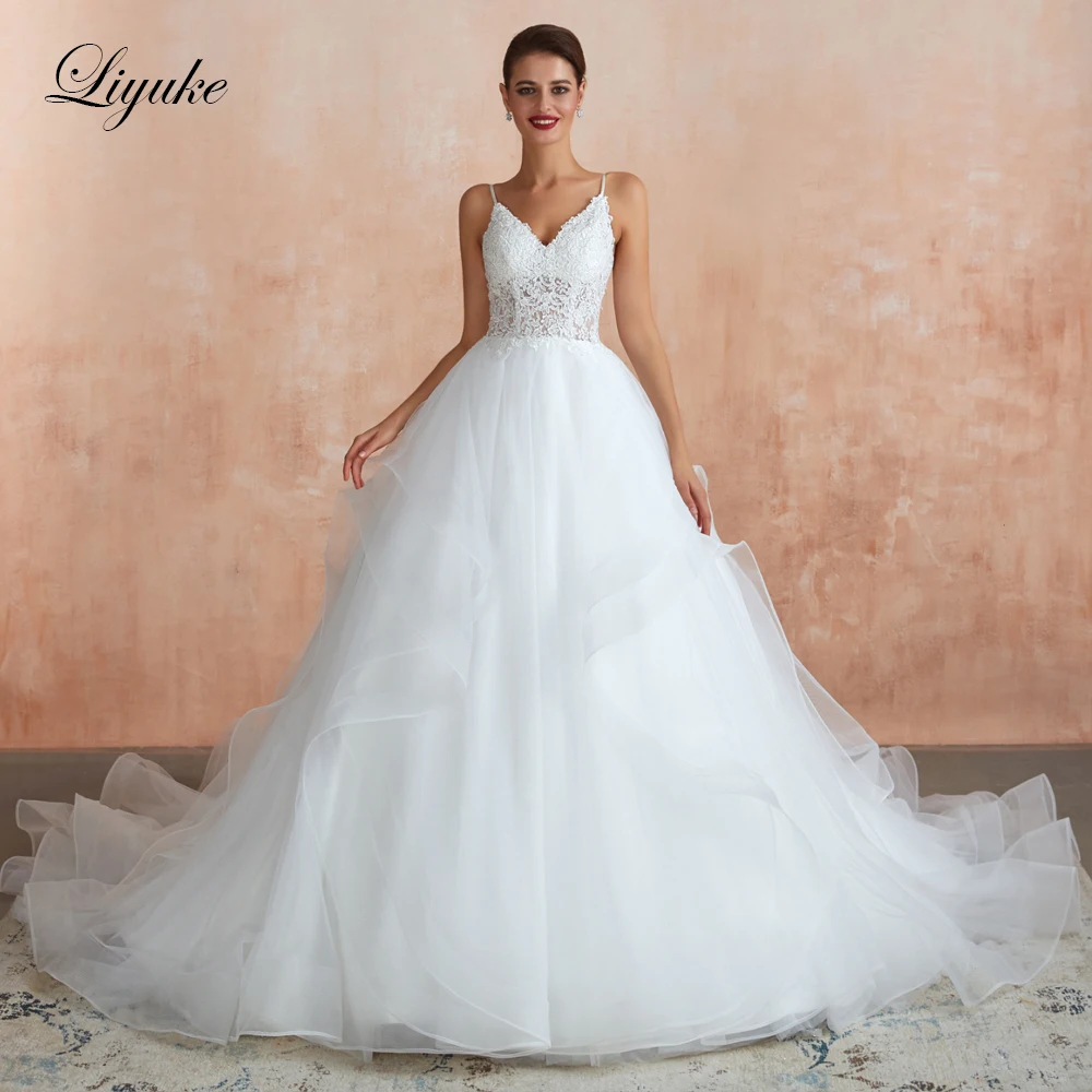 Liyuke Spaghetti Strap  A Line Wedding Dress Simple Lace With With Puffy Skirt Court Train