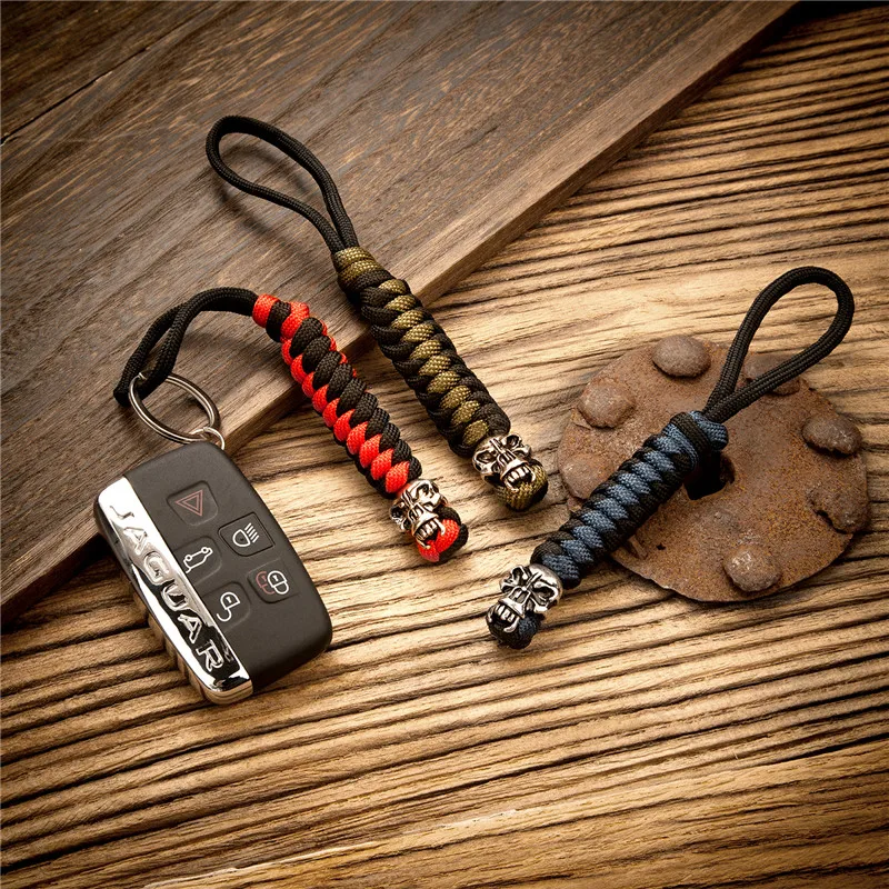 Outdoor Camping Equipment Punk Skull Metal Keychain Lanyard Handmade Woven Survival Paracord Rope Kyechain Keyring Jewelry