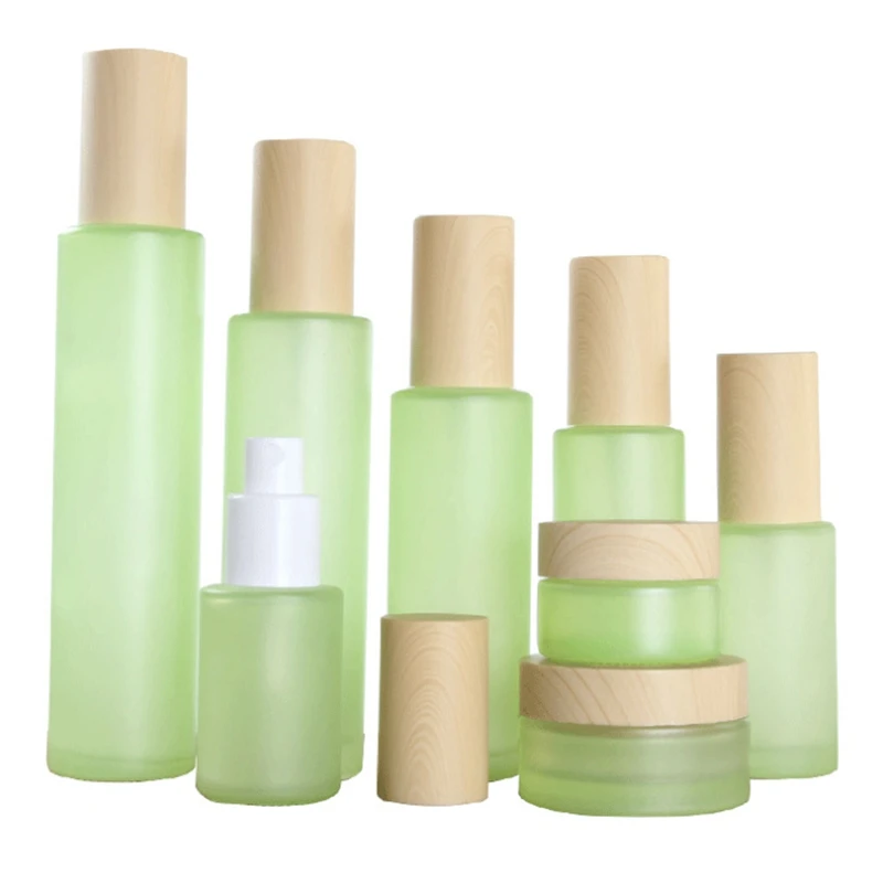 

50Pcs 20g 30g 50g 20ml 30ml 40ml 50ml 60ml 80ml 100ml 120ml green Frost Glass Cream Jar with Wooden line Cap Lotion Spray bottle