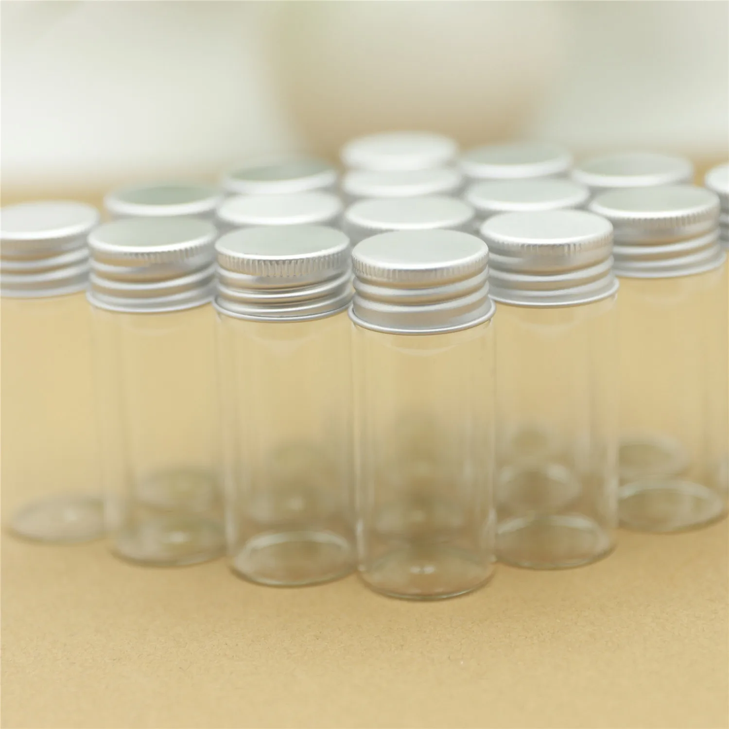 

12 Pieces 30*70mm 30ml Small Glass Vial Bottles Aluminum Caps Glass Tiny Jars Transparent Glass Containers Perfume Bottles