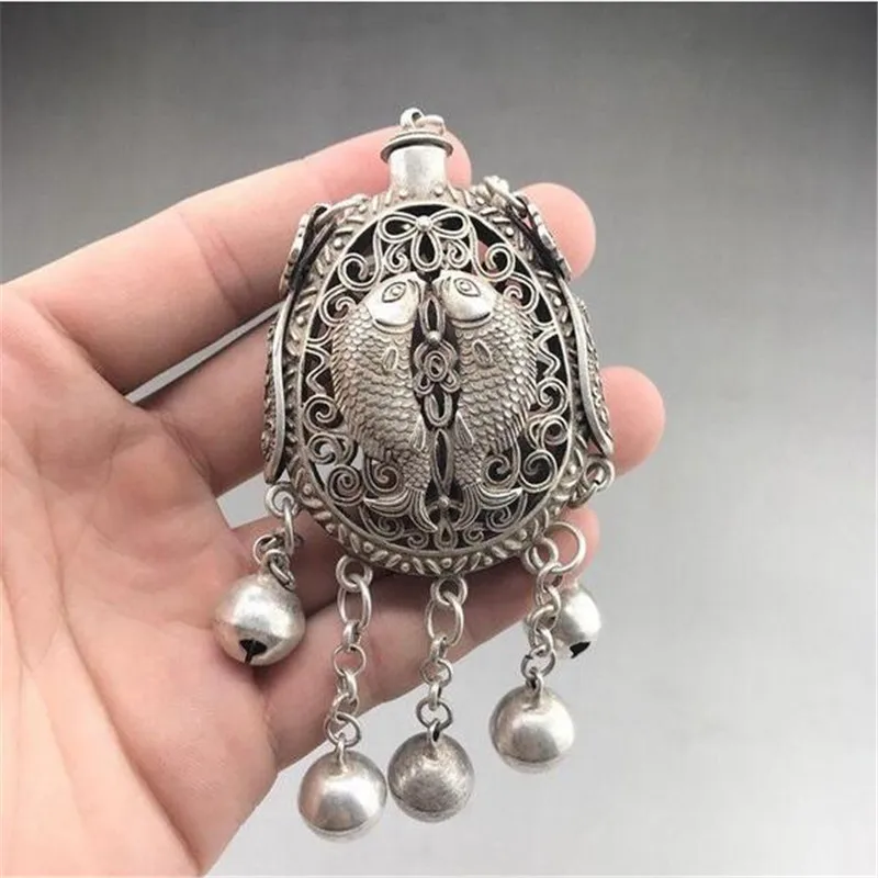 Ancient Tibetan silver snuff bottles, hand-carved goldfish patterns.