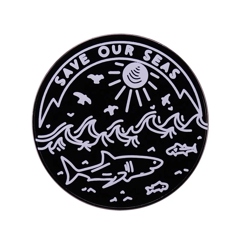 This adorable circle pin brooch is the perfect way to show off your love of the ocean and the importance of marine conservation!