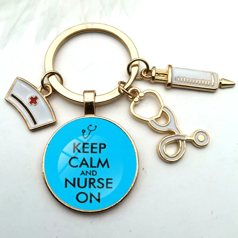 

New Rose Gold Fashion Personality Oil Drop Nurse Medical Syringe Stethoscope Key Ring Glass Convex Round Key Ring Pendant Gift