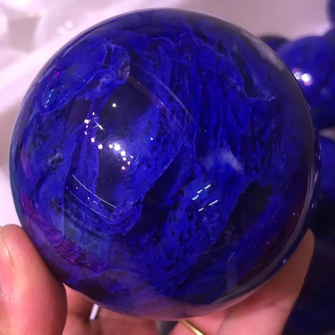 The natural blue smelting stone makes the perfect sphere.Crystalline energy is used for reiki healing