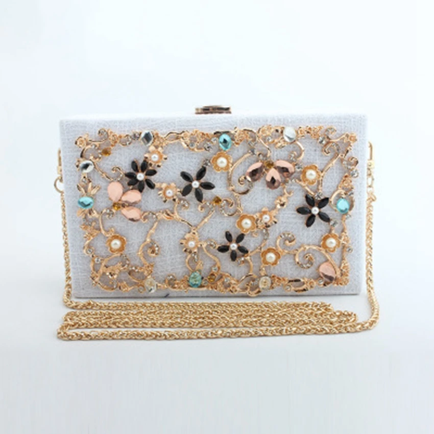 

Autumn and winter new linen fabric hollow diamond-studded alloy flower hand small square bag shoulder wedding dinner bag