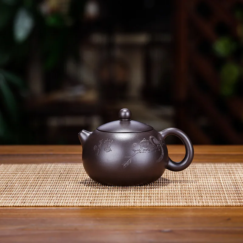 

Handmade Spherical Hole Purple Clay Teapot, Carved with Black Mud, Zisha Teapot, Kung-Fu Teaware, Purple Clay Drinkware