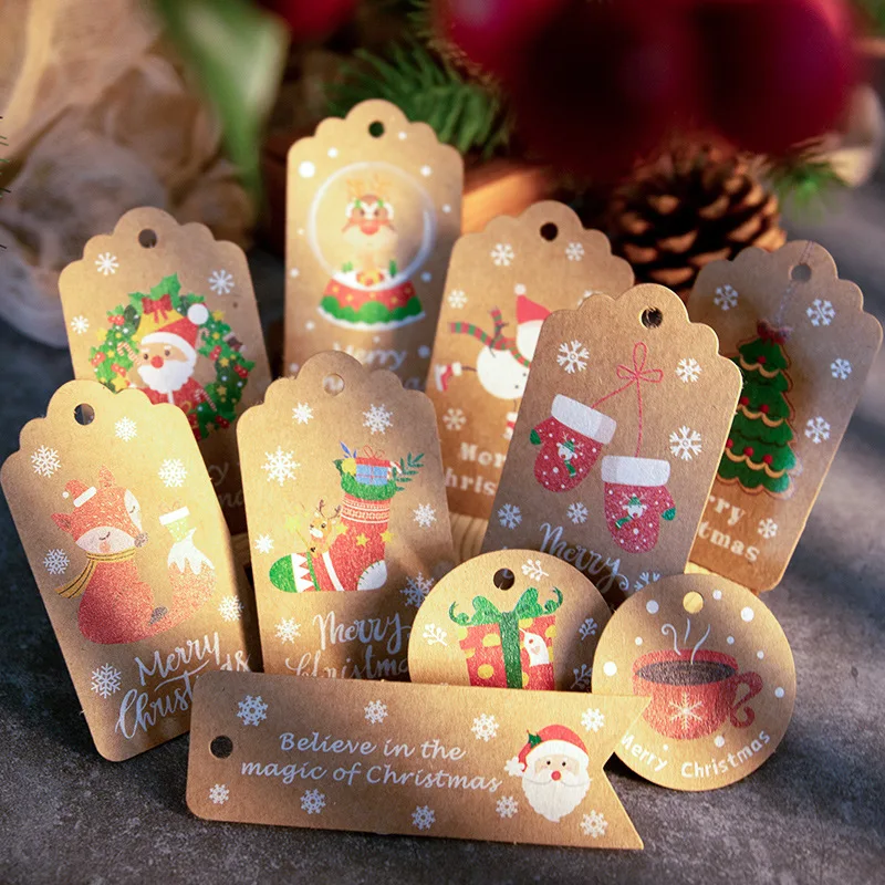 Cyuan 50pcs Regalo Di Natale Tag Babbo natale Fiocco di Neve di Carta Kraft Tag con la corda Etichetta Regalo di Natale per il Natale Del Partito