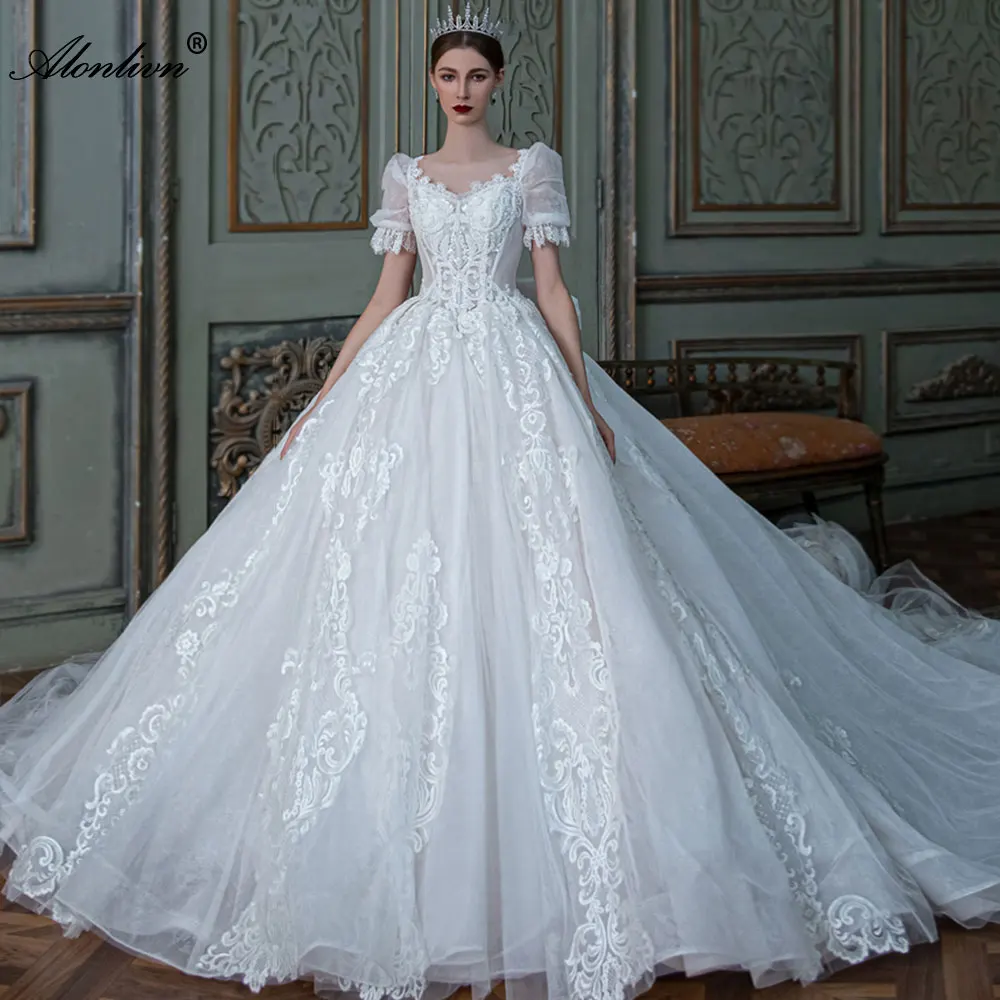 

Alonlivn Gorgeous Scoop Neckline Ball Gown Wedding Dress With Short Puffy Sleeve Royal Train Bride Gown