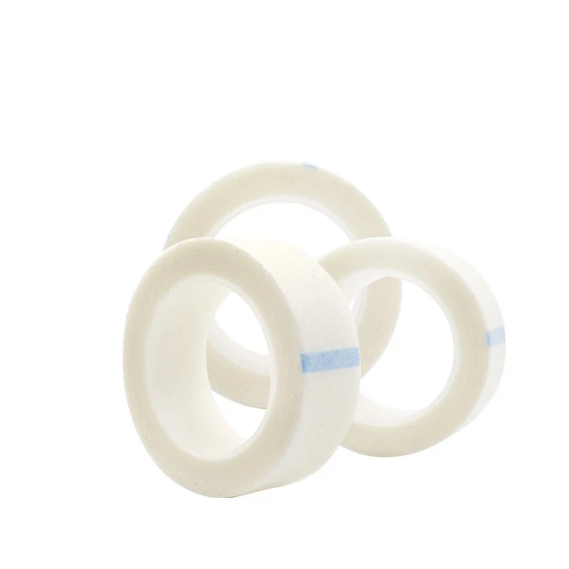 Weiße 24 Rollen Vlies-Wickelband Medizinisches Klebeband Wimpernverlängerung Fusselfreie Augenpads Weißes Seidenpapier Unterpads Medizinische Klebebänder – Detail 4