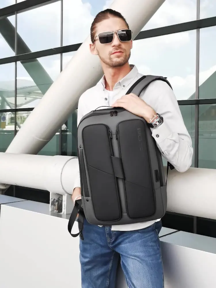 BANGE-Mochila con compartimento multifuncional para hombre y mujer, morral con diseño curvo minimalista para ordenador portátil de 15,6 pulgadas,