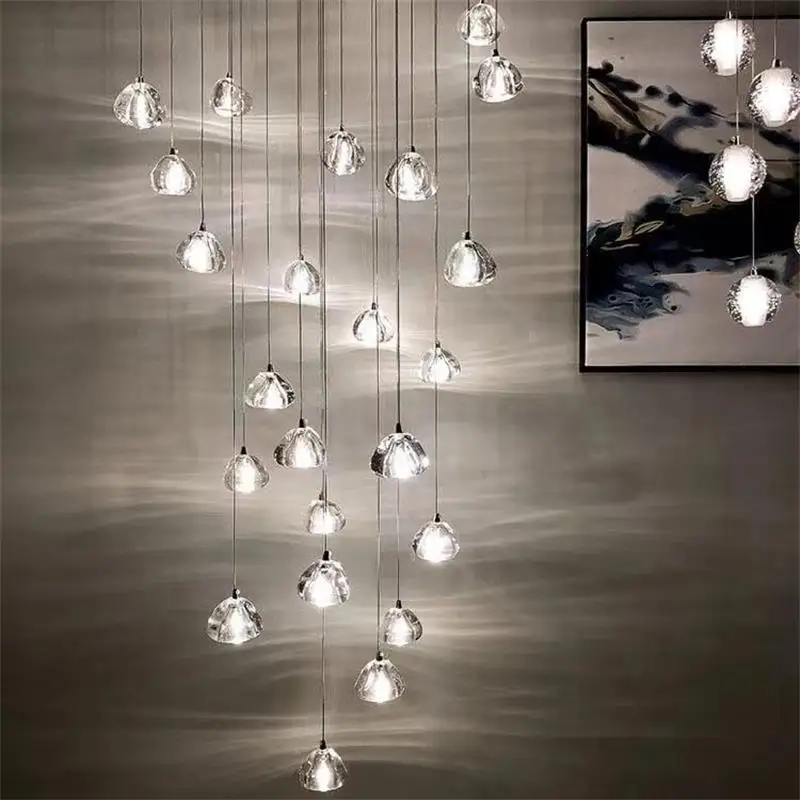 Modern K9 crystal ball chandelier is used in villa hotel lobby living room restaurant duplex staircase lounge long hanging lamp