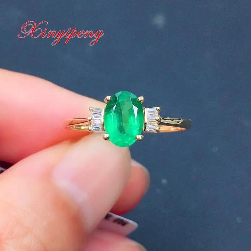 

Xin Yipeng 18K yellow gold inlaid real natural emerald ring fine green gemstone jewelry holiday anniversary gift for women 5×7mm