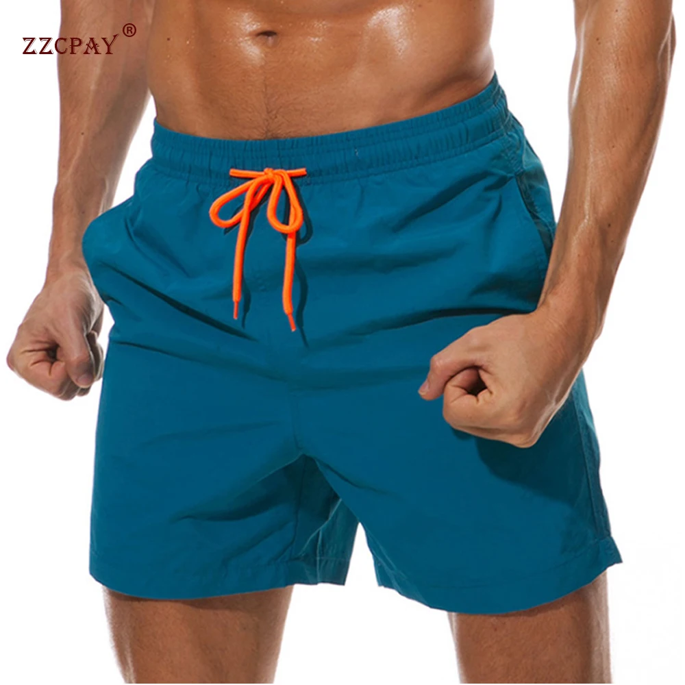 Men Swim Trunks Quick Dry Beach Shorts with Pockets and Mesh Lining Casual Shorts Elastic Waist Comfy Workout Shorts Drawstring