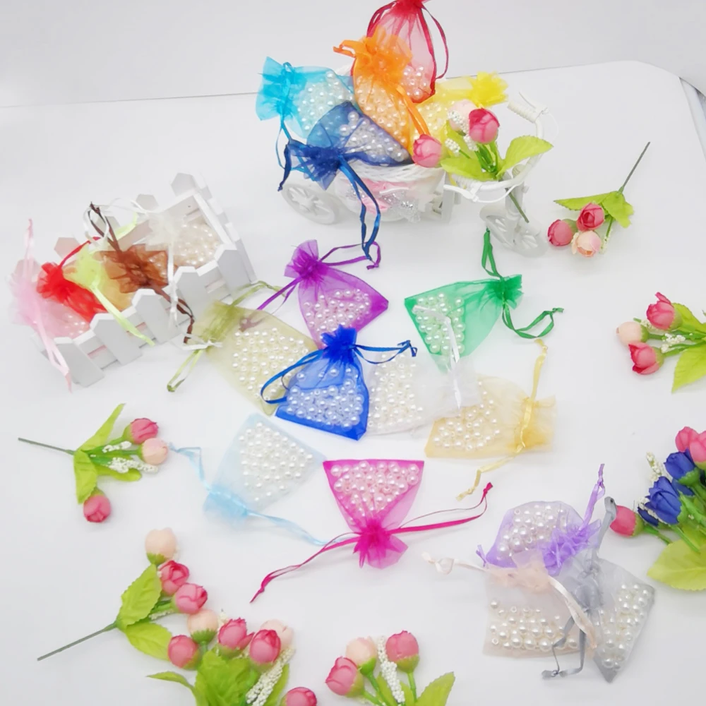 50pcs Sacchetto del Regalo 9x12cm Piccoli sacchetti di Organza Sacchetti Regalo Per La scatola di Presentazione di Imballaggio Sacchetto di Immagazzinaggio Borse multiuso Monili di Cerimonia Nuziale sacchetto del