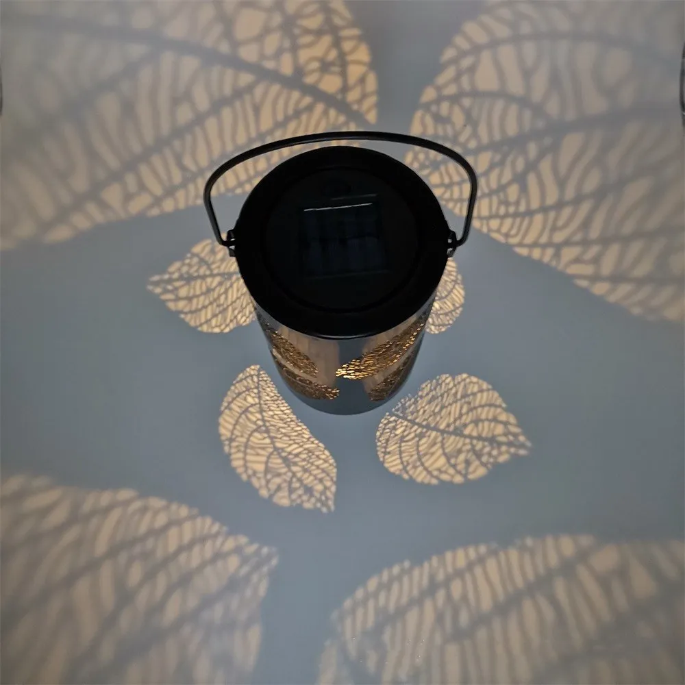 

New European solar led wrought-iron lantern lamp creative hollow outdoor garden lamp portable hanging lamp garden lamp