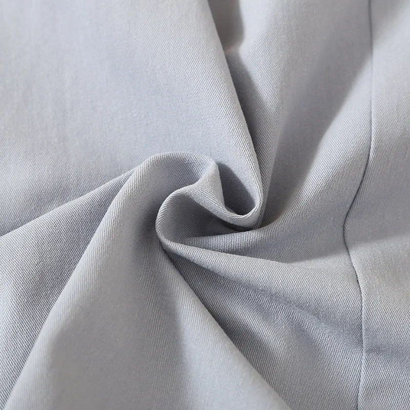 الصيف الخريف التنانير النسائية 2023 ميدي طول الركبة الكورية أنيقة زر تنورة عالية الخصر الإناث مطوي تنورة المدرسة