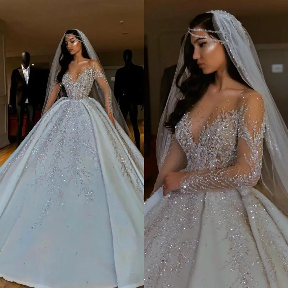 

Luxurious New 2020 African Wedding Dresses Sheer Neck Long Sleeves Bridal Dresses Beaded Sequins Satin Wedding Gowns