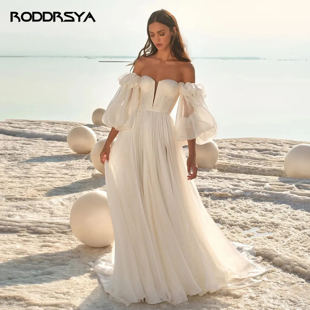 RODDRSYA Boêmia praia de casamento de manga longa e flácida de neve doce vRODDRSYA Boho Vestidos De Casamento Praia Longo Puffy Mangas Chiffon Querida Vestido De Casamento Varrer Trem Custom Made Split Vestido De Noiva