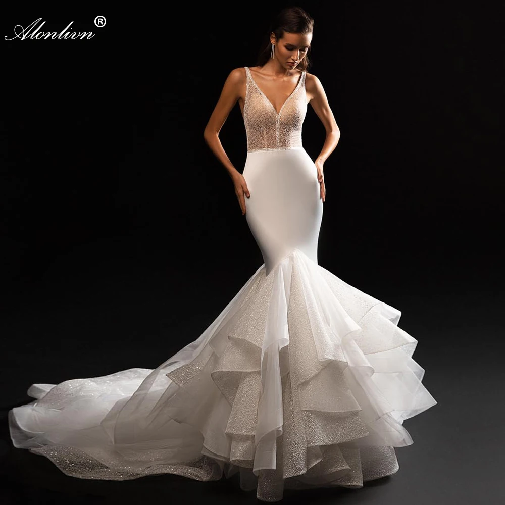 

Alonlivn Luxury Beading Pearls Crystals Trumpet Wedding Dress Spaghetti Straps Tiered Train Mermaid Bridal Gowns