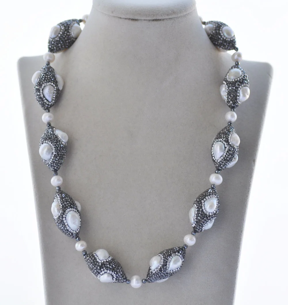 

Z10955 19" 30mm White Pearl Shuttle CZ Bead Necklace