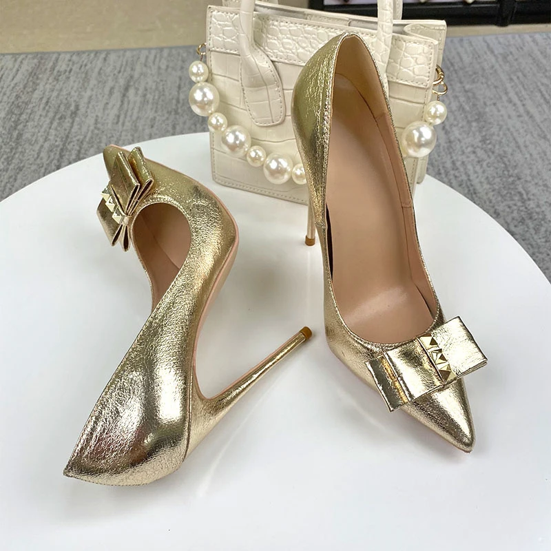 Romantic silver bow decoration gold pointed toe 8cm 10cm 12cm high thin heel dating party plus size ladies pumps YG052 ROVICIYA