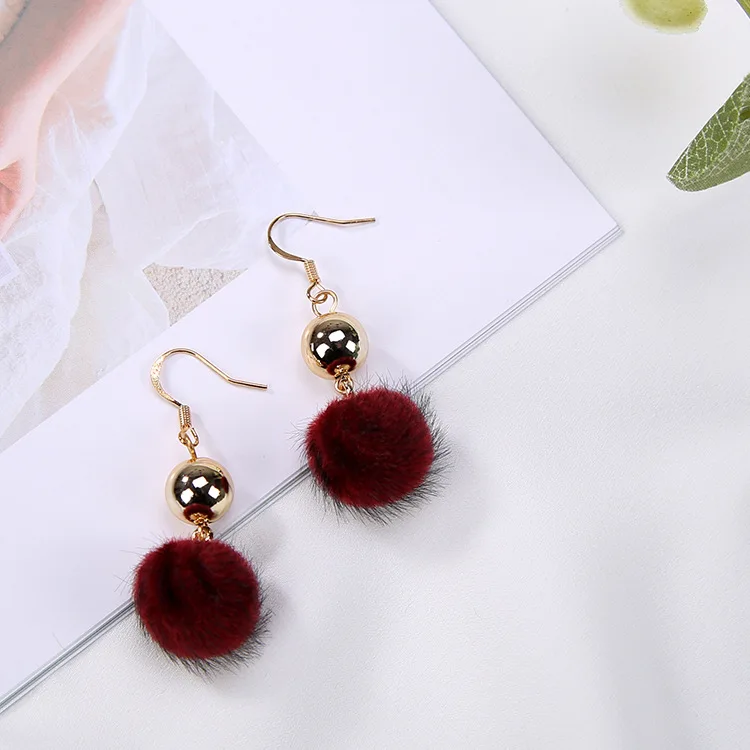 Korean version of the new earrings cute sweet metal ball tassels autumn and winter long paragraph pompom fashion girls jewelry